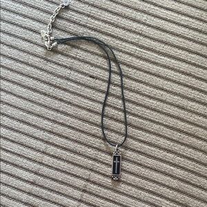 Elegant Black and Silver Cross Pendant Necklace